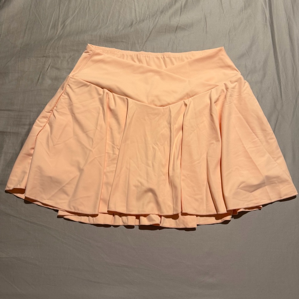 HALARA SoftlyZero Airy Crossover skort with Side Pockets and Cool Touch in Peach